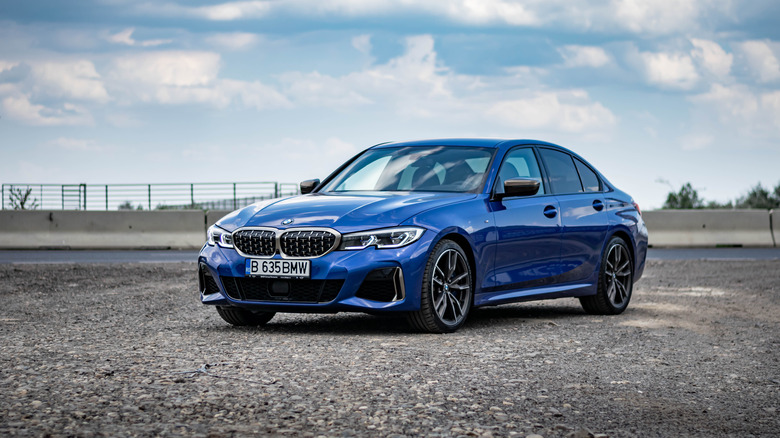 Blue BMW parking lot