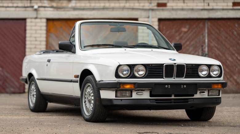 White BMW E30 with top down