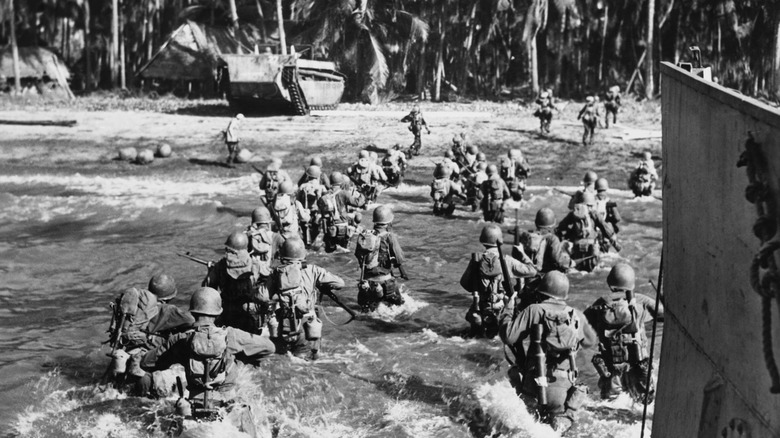 Soldiers storming beach WWII