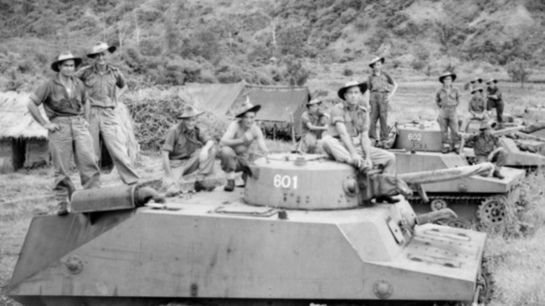 Marines posing with captured Type 2 Ka-Mi tanks