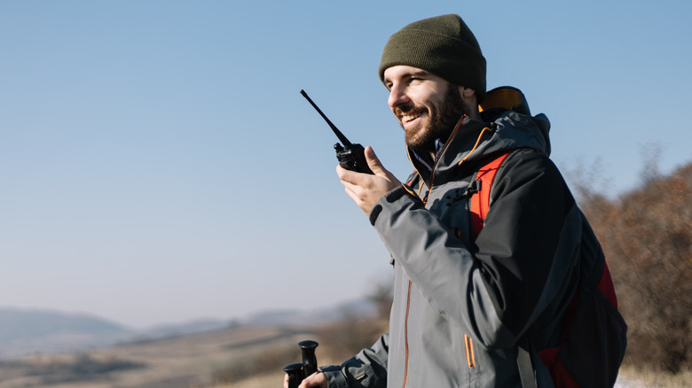 man using walkie talkie