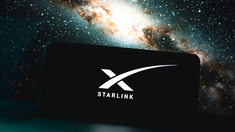 Starlink on a smart phone with stars in the background