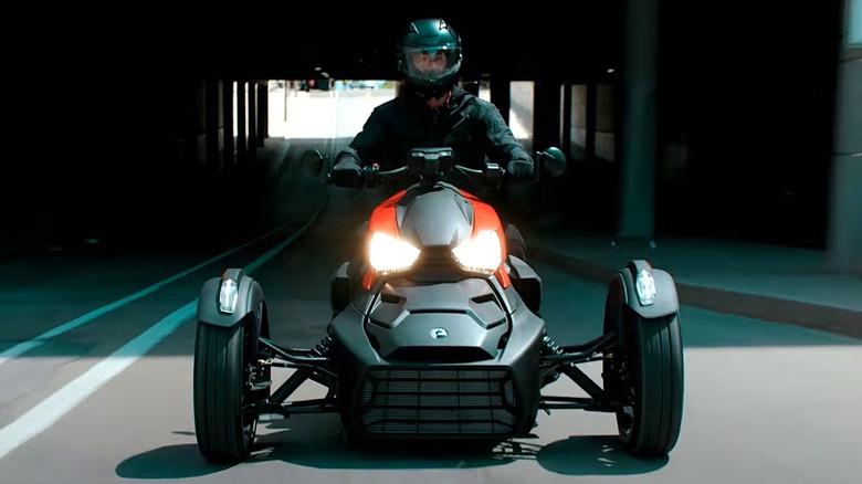 Person riding Can-AM Ryker 3-wheel motorcycle