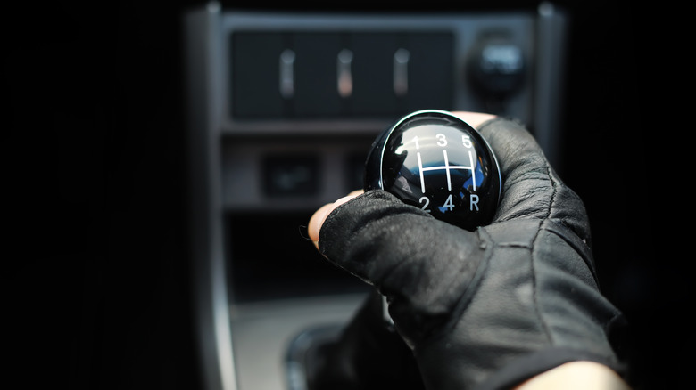 Manual Gear Shift With Gloved Hand