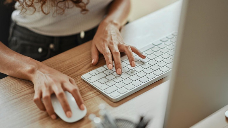 woman working mac computer