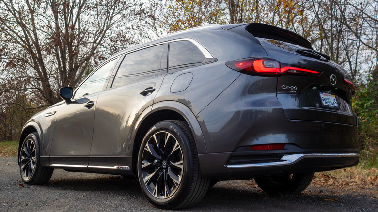 2025 Mazda CX-90 parked under some trees