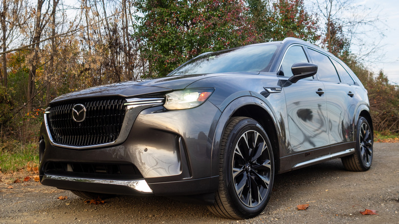 2025 Mazda CX-90 parked under some trees