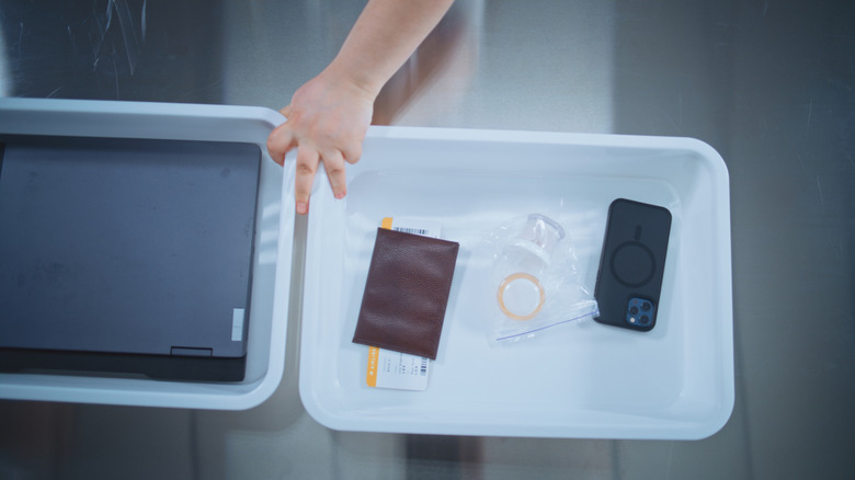 Objects in bins going through airport security