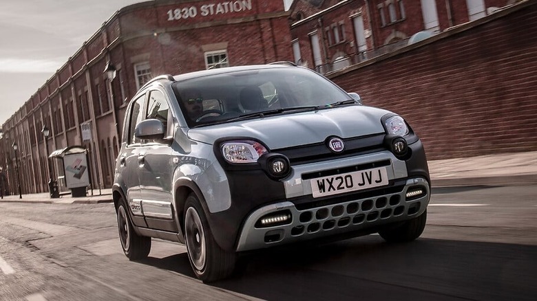 Fiat Panda hybrid driving down a street