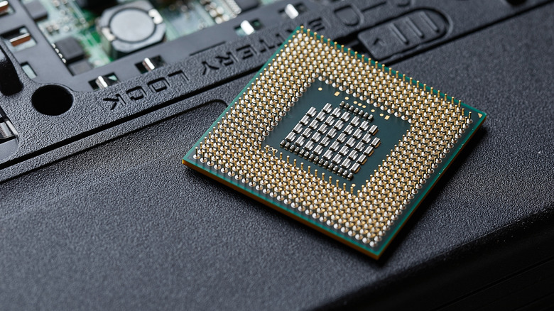 Laptop CPU sitting on an opened laptop