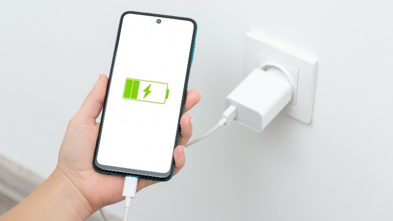 Charging a phone using a wall outlet