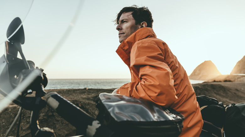 Man sitting on motorcycle