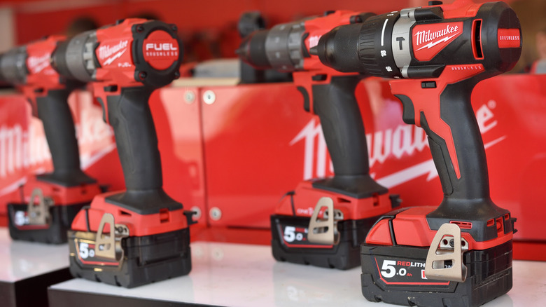 Milwaukee drills equipped with Milwaukee batteries.