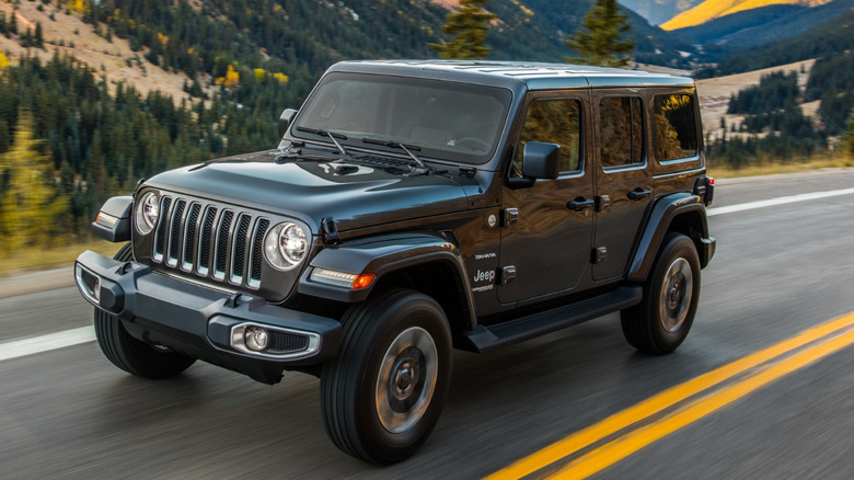 Jeep Wrangler hardtop driving on the highway