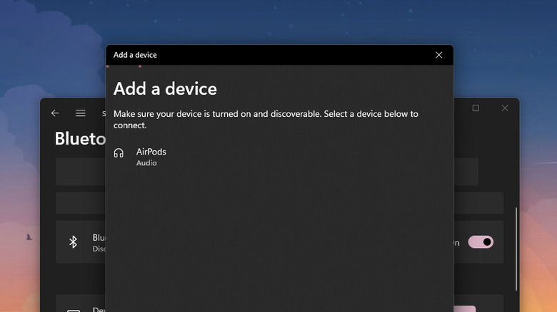 Add a device dialog box on Windows showing the AirPods in the discovered Bluetooth devices