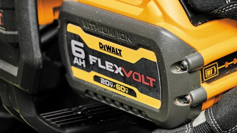 A DeWalt Flexvolt battery in a DeWalt tool.