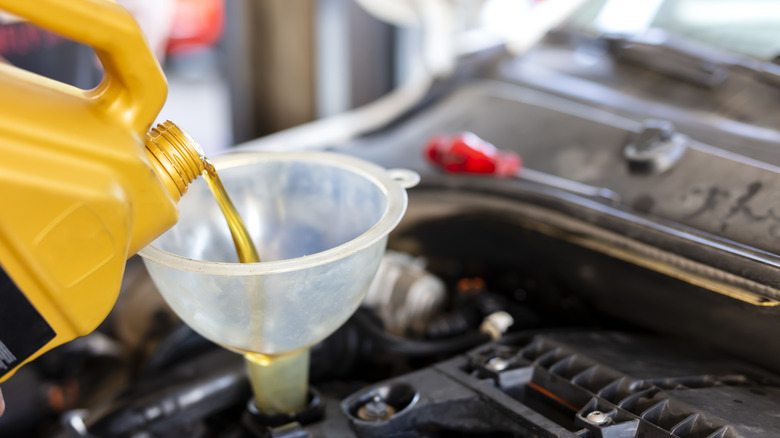 Oil poured into an engine