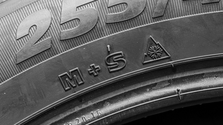 Tire side view with M+S (Mud and Snow) and 3PMSF (Three Peak Mountain Snow Flake) symbols.