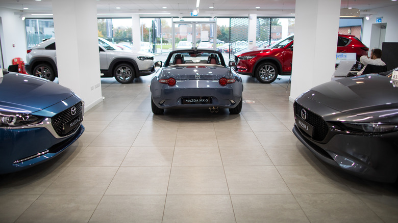 Mazda vehicles in a showroom