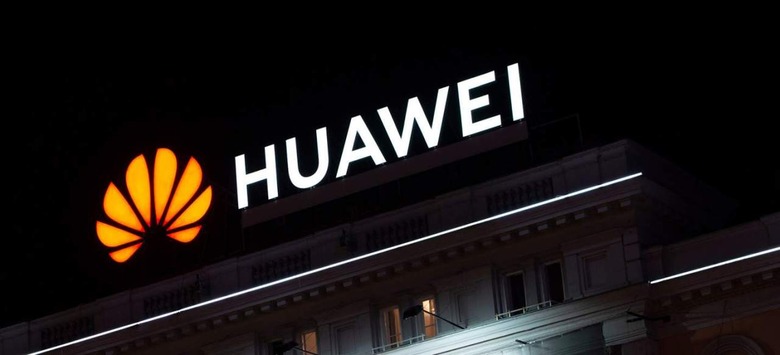 An illuminated Huawei logo 