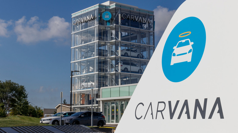 Carvana logo with vending machine in background