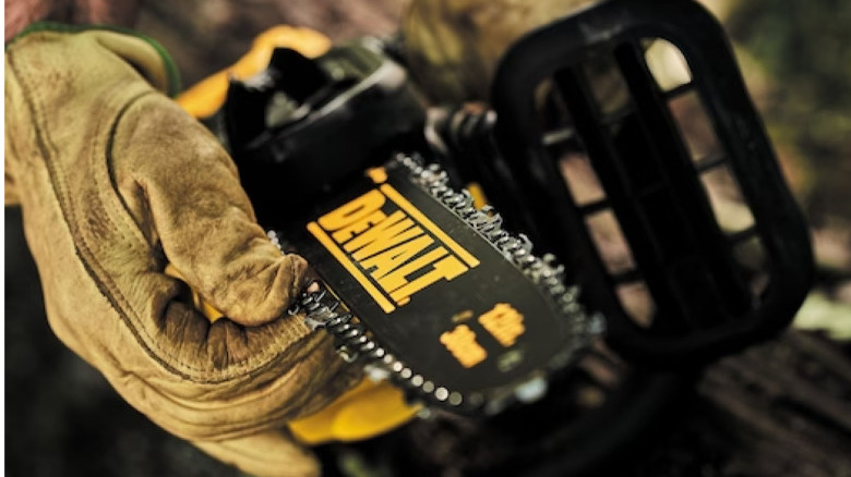 Checking tension on DeWalt chainsaw