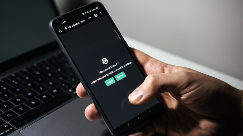 Person using ChatGPT smartphone
