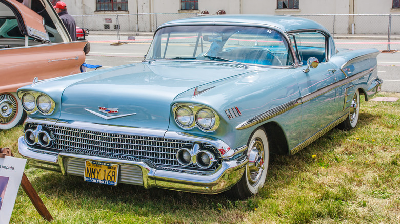 A 1958 Chevrolet Bel Air Impala in pale blue, front 3/4 view