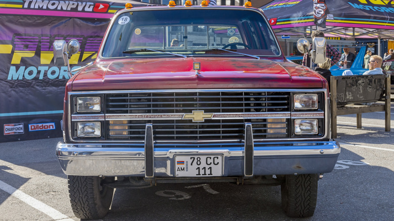 Red Chevrolet C series pickup truck