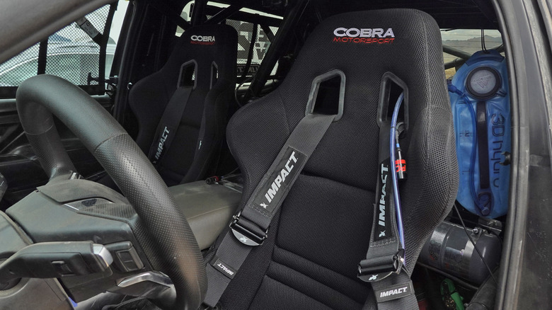 Chevrolet Silverado EV ZR2 interior race seats and roll cage detail