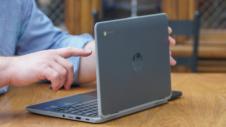 Person using HP Chromebook