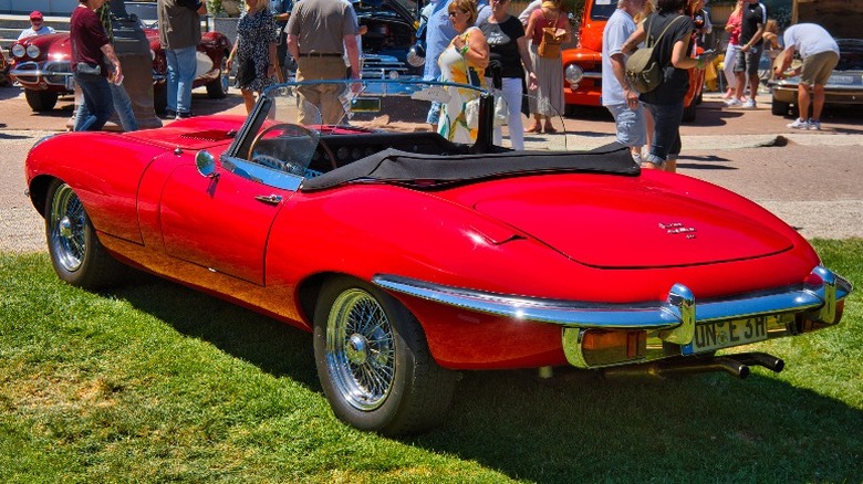 red 1961 Jaguar E-Type at a car show