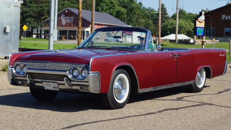 red 1961 Lincoln Continental Convertible