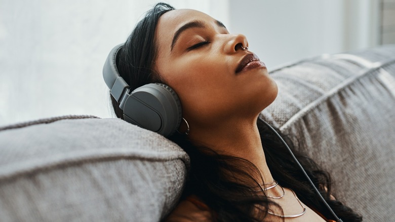 A woman wearing headphones