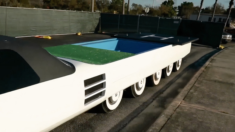 limo's putting green, pool, and helipd