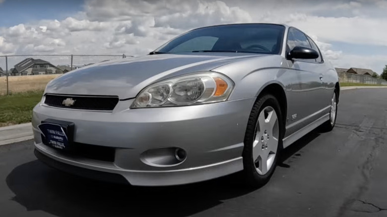 SIlver Chevy Monte Carlo SS parked on street under cloudy sky