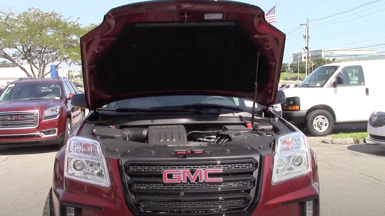 Hood raised to expose engine in 2017 GMC Terrain