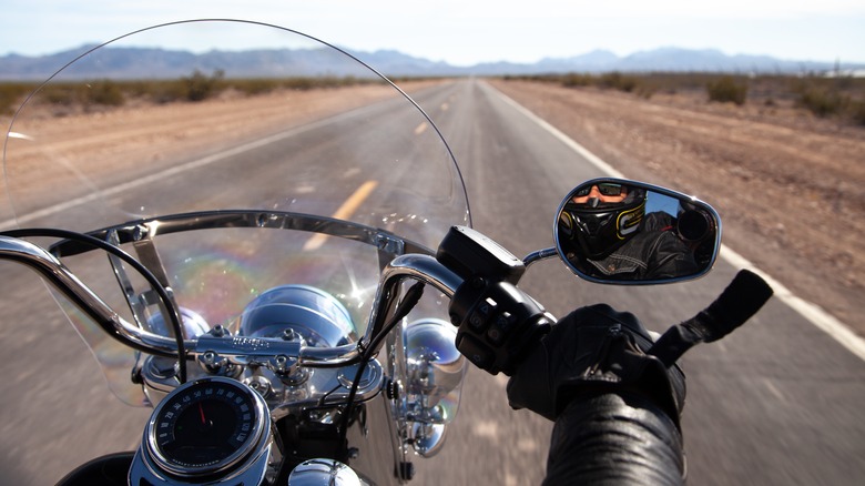 riding Harley-Davidson motorcycle on Nevada road