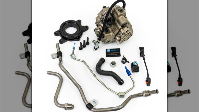 A CP3 pump conversion kit for Duramax diesel engines on white background