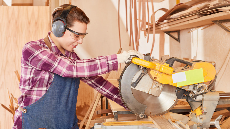 Person using miter saw