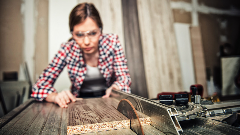 Person using table saw