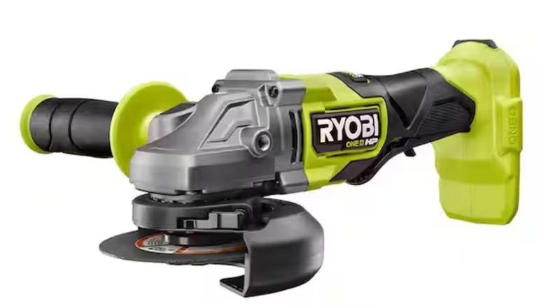 A Ryobi angle grinder on white background