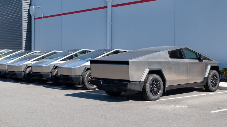 Tesla Cyberbeast in car lot along with Cybertrucks