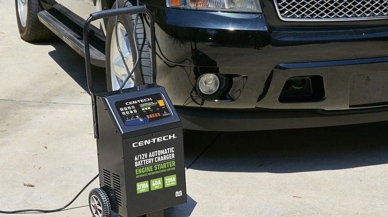 CEN-TECH automatic charger beside vehicle