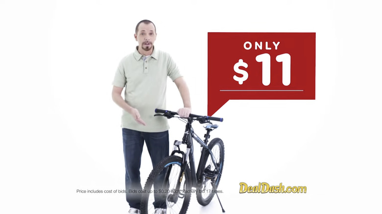 DealDash TV commercial showing bike