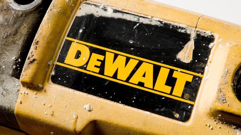 Logo for DeWalt tools on side of well-used device