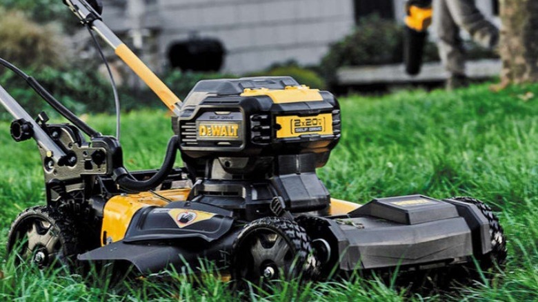 close up of DeWalt mower cutting grass