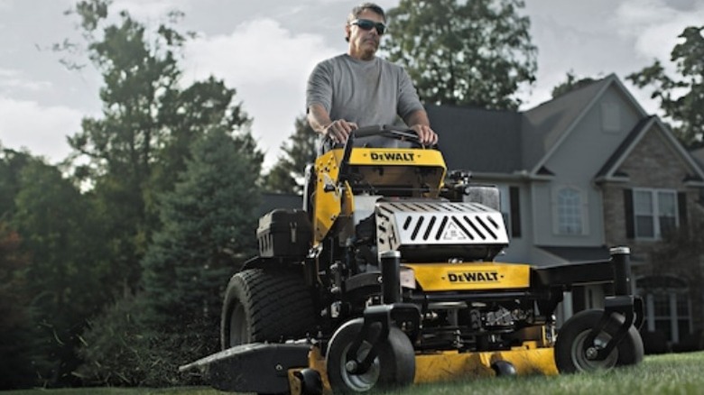 Man riding DeWalt mower