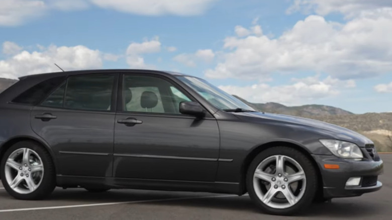 Lexus IS300 SportsCross on scenic driveway