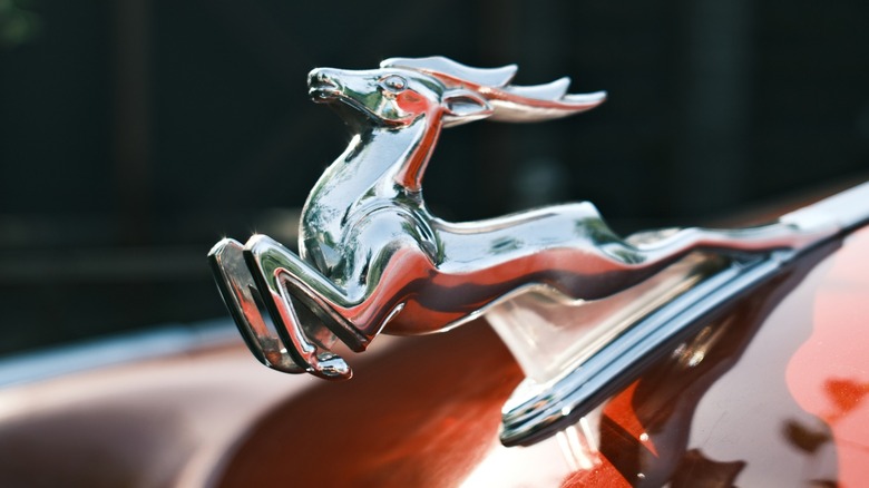 Close-up image of a Volga hood ornament